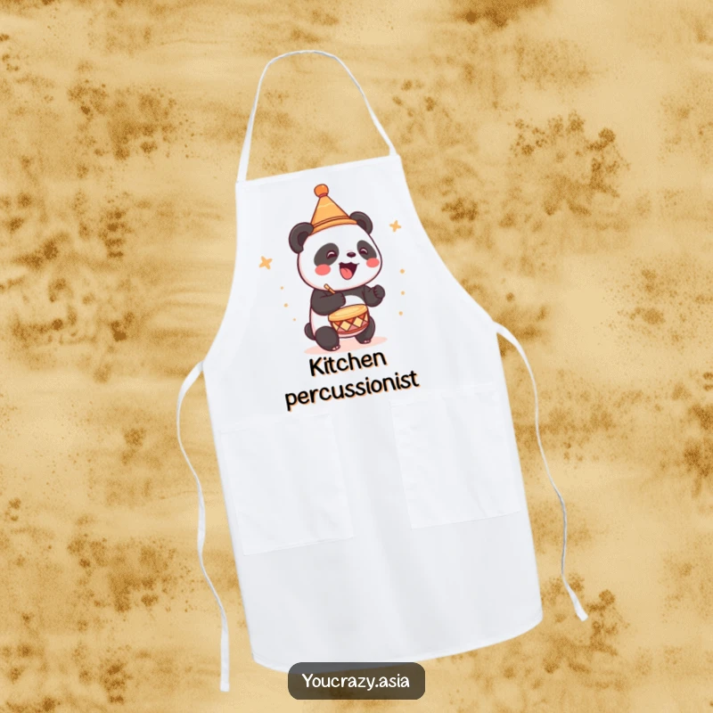 Funny apron showing a cute panda wearing a small conical hat, joyfully drumming while cooking.