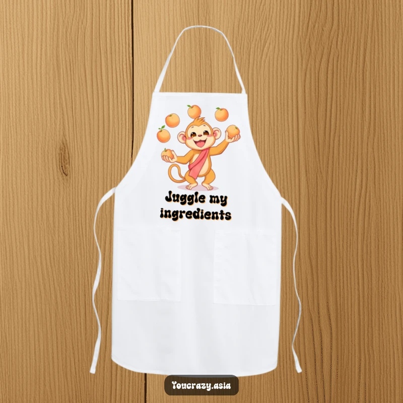 Funny Juggling Monkey Apron: A cheerful golden monkey in a silk sash enthusiastically juggles peaches, adding humor and fun to your cooking.